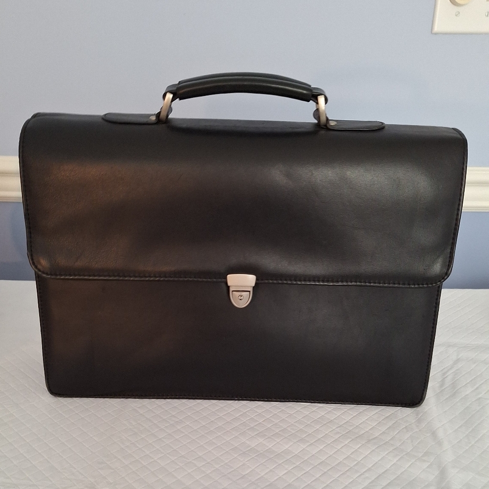 Wilson leather black atache brief case.